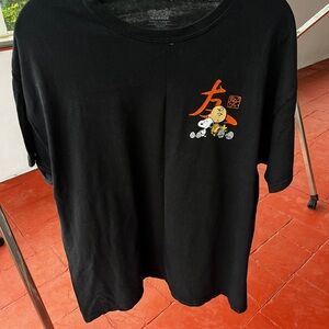 Peanuts Black and Orange Graphic Tee